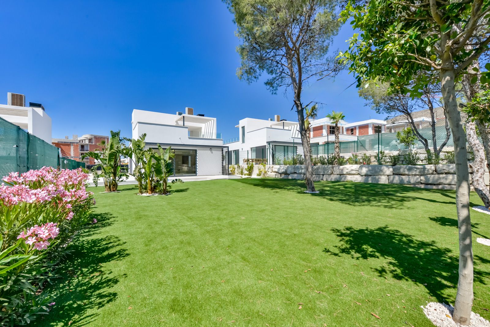 Modern Key-Ready Villas with Spacious Interiors and Landscaped Gardens
