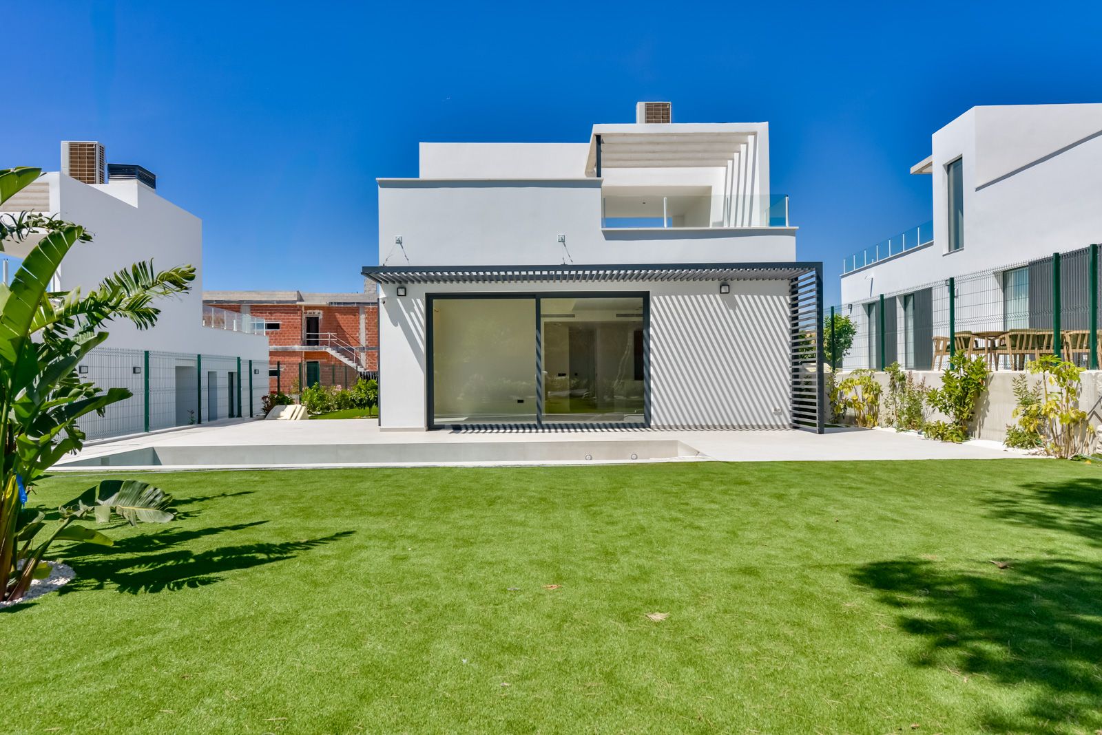 Modern Key-Ready Villas with Spacious Interiors and Landscaped Gardens