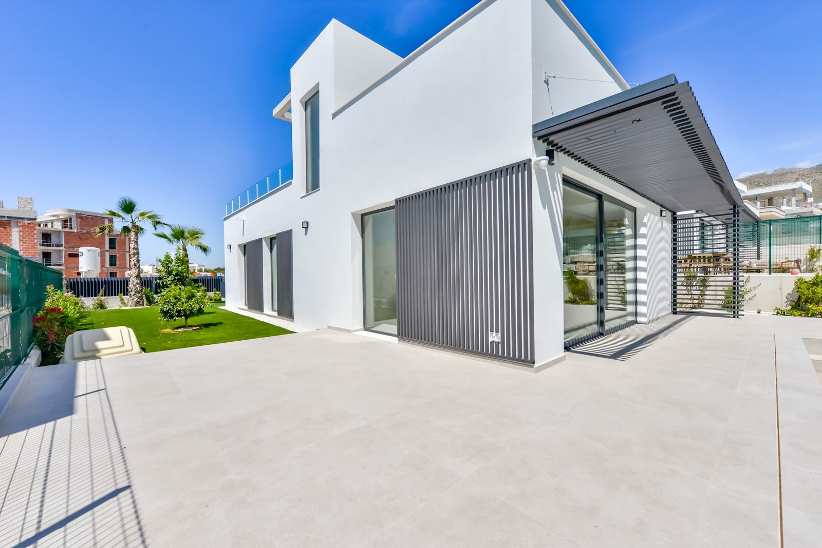 Modern Key-Ready Villas with Spacious Interiors and Landscaped Gardens